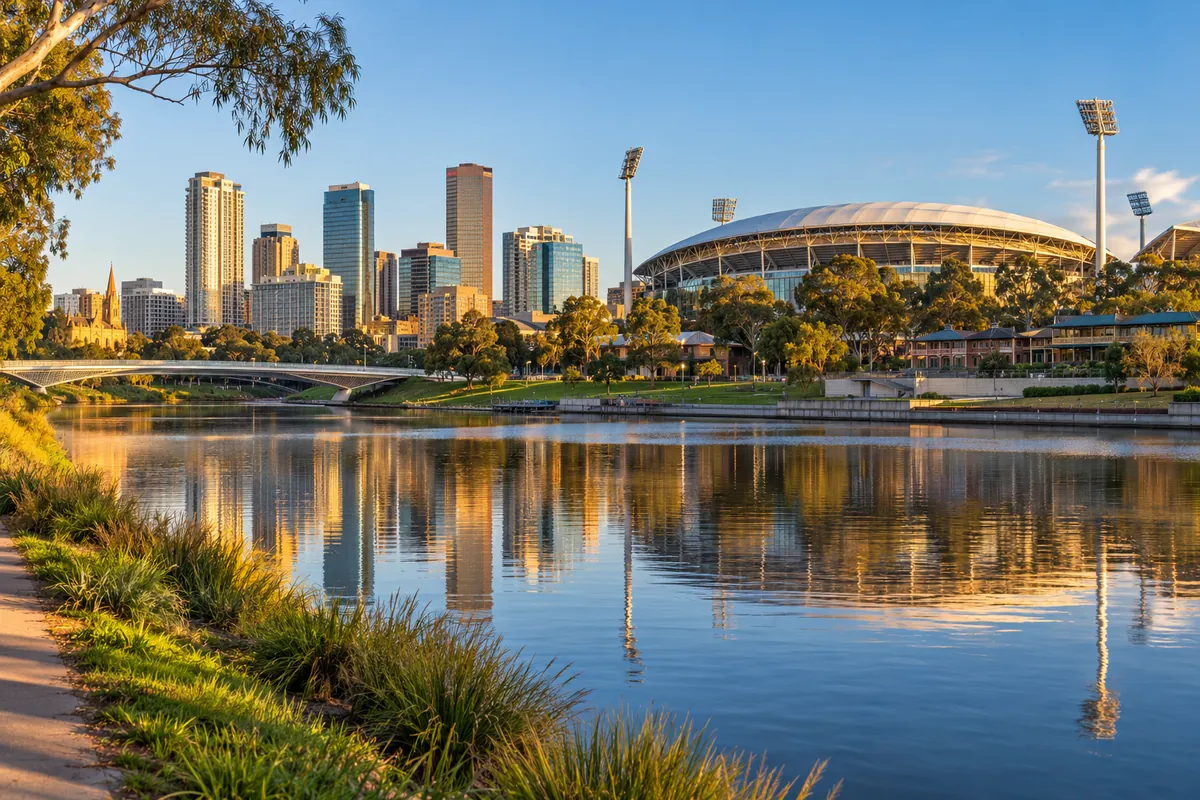 Adelaide city skyline across the River Torrens in warm light