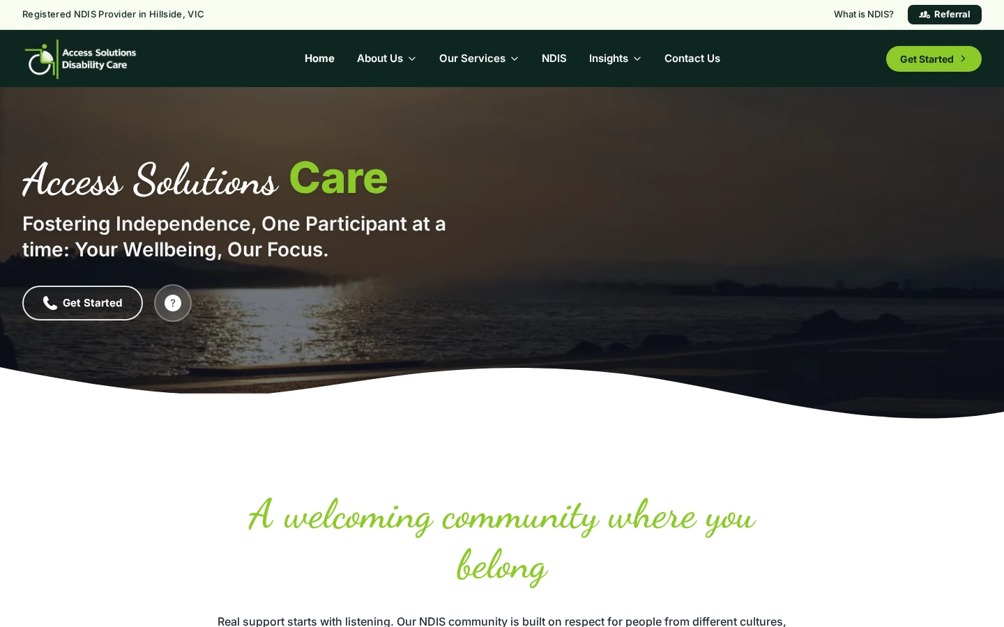 Access Solutions Care homepage with dark-green NDIS navigation and introductory message