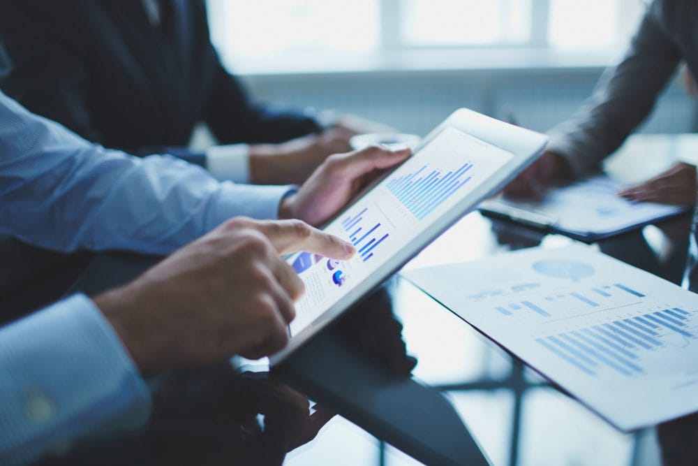 ERP Services 4 Team configuring ERP customization solutions on dashboards for streamlined business operations and workflow optimization.